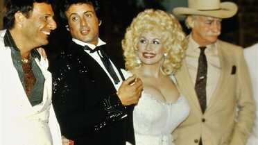 the poster for the movie Rhinestone from 1984